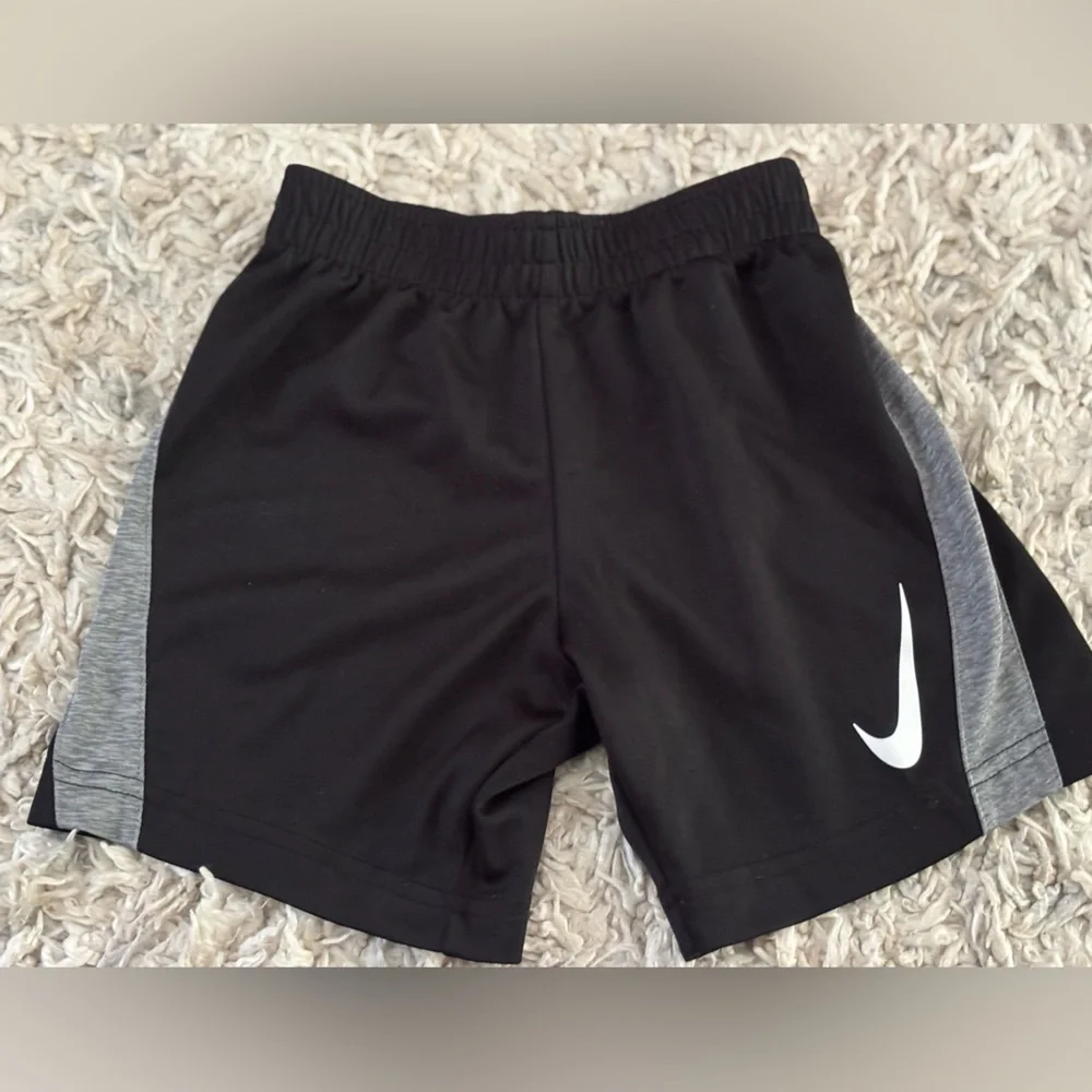 Nike Black and Gray Boys Athletic Shorts with White Swoosh